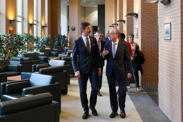 Minister of Foreign and European Affairs of Slovakia and the OPCW Director-General with their delegations.